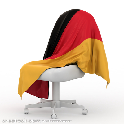Flag of Germany on white chair.